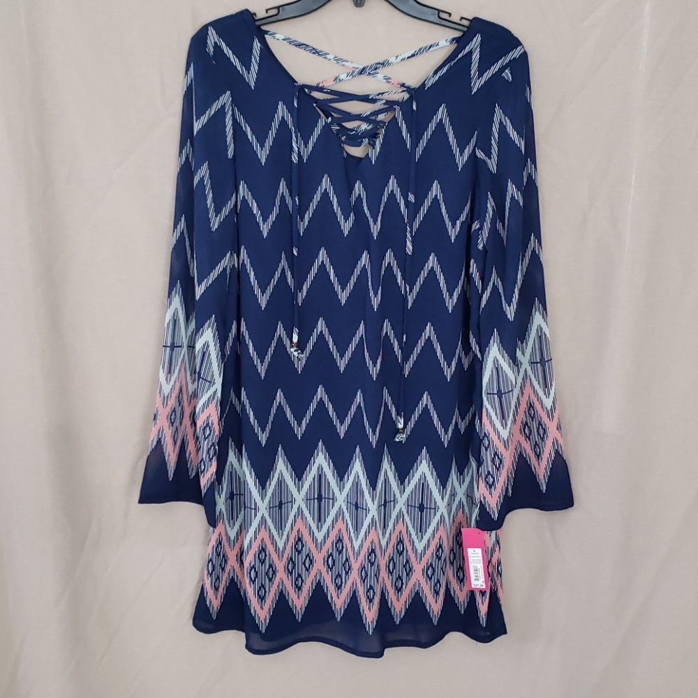 NWT Flowy dress with sheer long sleeves.